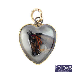 A late Victorian gold horse reverse-carved intaglio pendant.
