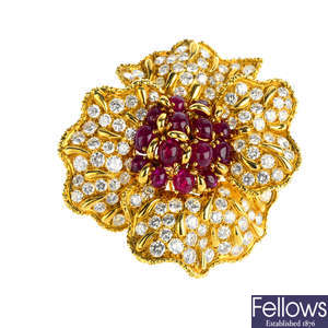 A mid 20th century, 1970s, ruby and diamond floral brooch.