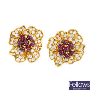 A pair of mid 20th century, 1970s, ruby and diamond floral earrings.