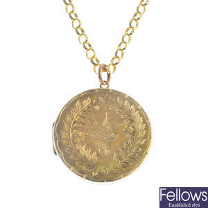 An early 20th century back and front locket, with chain.