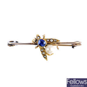 A late Victorian gold, sapphire and split pearl fly brooch.