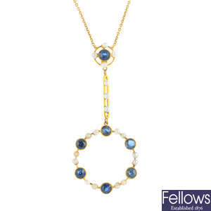An Edwardian gold sapphire and seed pearl pendant, with chain.