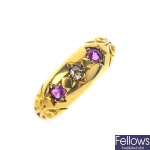 A late Victorian 18ct gold ruby and diamond three-stone ring.