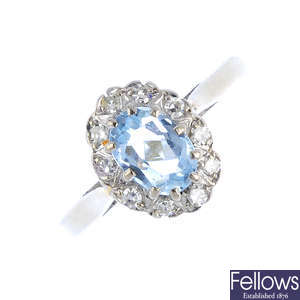 An 18ct gold aquamarine and diamond cluster ring.
