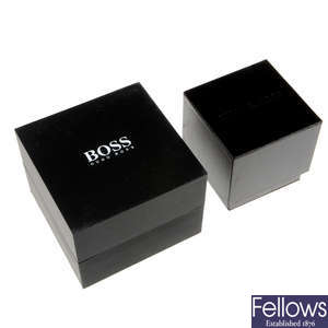 A group of boxed watches, to include examples by Boss and Michael Kors. Approximately 50.