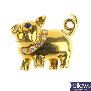 An 18ct gold sapphire and diamond pig brooch, by E. Wolfe & Co.
