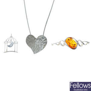 A selection of silver jewellery items.