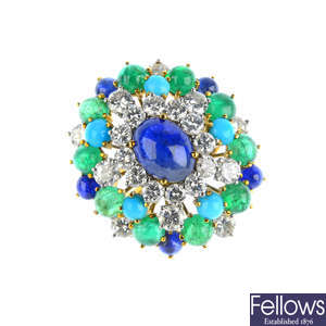 A sapphire, diamond, emerald and turquoise dress ring.