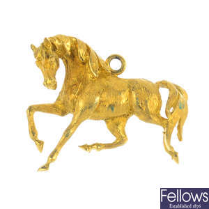 A horse pendant.