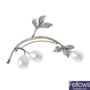 A cultured pearl and diamond brooch.
