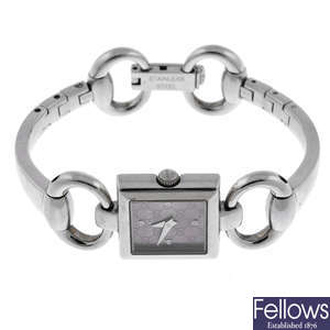GUCCI - a lady's stainless steel Tornabuoni bracelet watch.