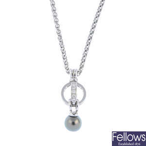 GARRARD - an 18ct gold cultured pearl and diamond pendant, on chain.
