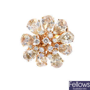 A diamond floral cluster ring.