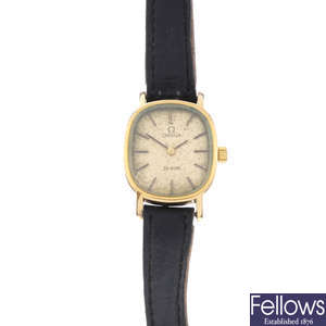 OMEGA - a lady's gold plated De Ville wrist watch with a Vertex watch.