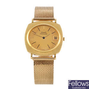 PIAGET - a gentleman's 18ct yellow gold bracelet watch.