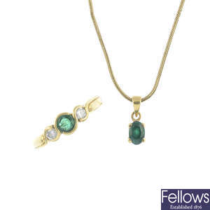 An 18ct gold emerald and diamond ring, and an emerald pendant with a chain.