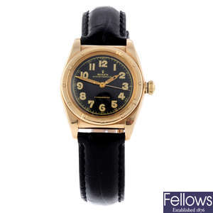 ROLEX - a gentleman's 14ct yellow gold Oyster Perpetual "Bubbleback" wrist watch.