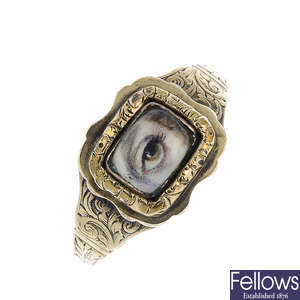 A late Georgian 9ct gold portrait miniature or lover's eye ring.