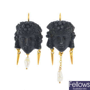A pair of mid Victorian bog oak cameo and cultured pearl earrings.