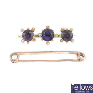 Two early 20th century 9ct gold amethyst and split pearl brooches.