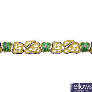 A mid 20th century ruby and enamel bracelet.