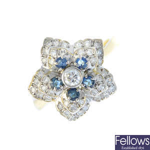 An 18ct gold diamond and sapphire flower ring.