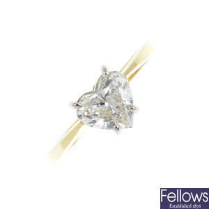 An 18ct gold laser-drilled diamond single-stone ring.