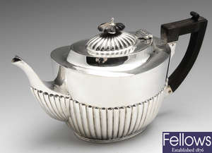 An Edwardian silver bachelor teapot.