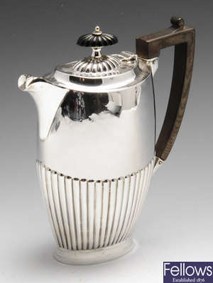 An early twentieth century silver hot water jug.