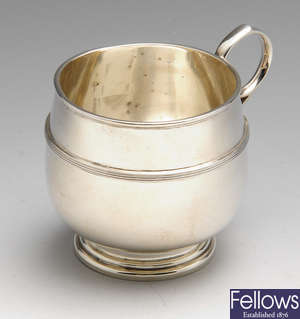 A 1920's silver christening mug.