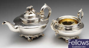 An early Victorian silver teapot and twin-handled sugar bowl.