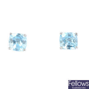 A pair of 18ct gold zircon earrings.