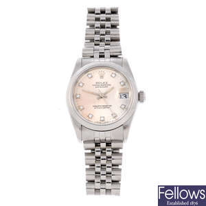 ROLEX - a mid-size stainless steel Oyster Perpetual Datejust bracelet watch.