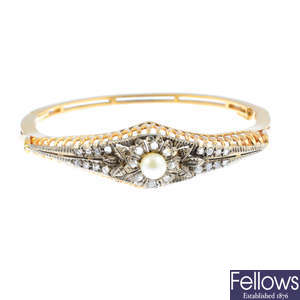A cultured pearl and diamond hinged bangle.