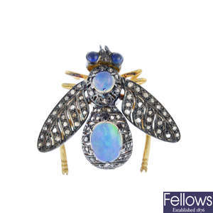 A gem-set bee brooch.