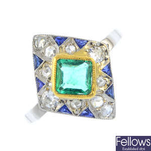 An Art Deco platinum emerald, sapphire and diamond ring.