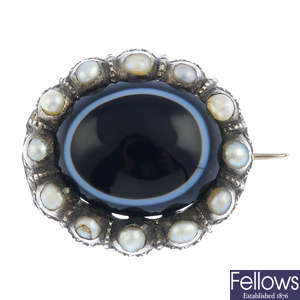 A mid Victorian silver banded agate and split pearl brooch.