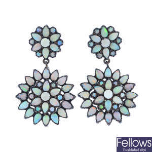 A pair of opal cluster earrings.