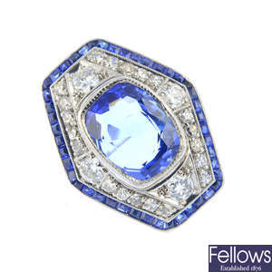 A Ceylon sapphire, sapphire and diamond cluster ring.