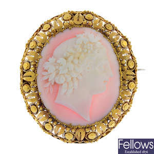 A mid Victorian gold conch shell cameo brooch.