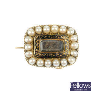A mid Victorian gold and split pearl memorial brooch.