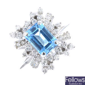 A topaz and diamond cluster ring.