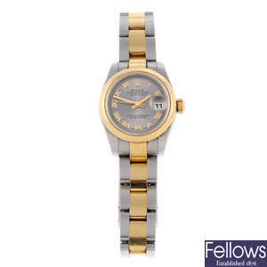 LONGINES - a lady's gold plated Presence bracelet watch.