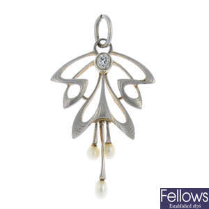 An Art Nouveau 15ct gold and platinum seed pearl and diamond pendant.