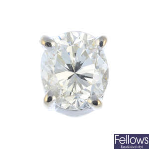 An oval-shape diamond single-stone single stud earring.
