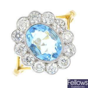 An aquamarine and diamond cluster ring.