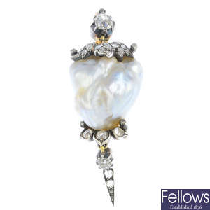 A late Victorian silver and gold baroque natural pearl and diamond pendant.