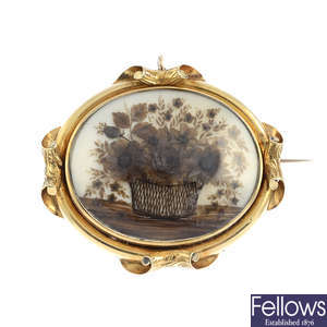 A mid 19th century gold memorial brooch.