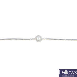 A 1930s platinum and 18ct gold, pearl and diamond bracelet.