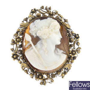 An early Victorian gold shell cameo brooch, and three mounts.